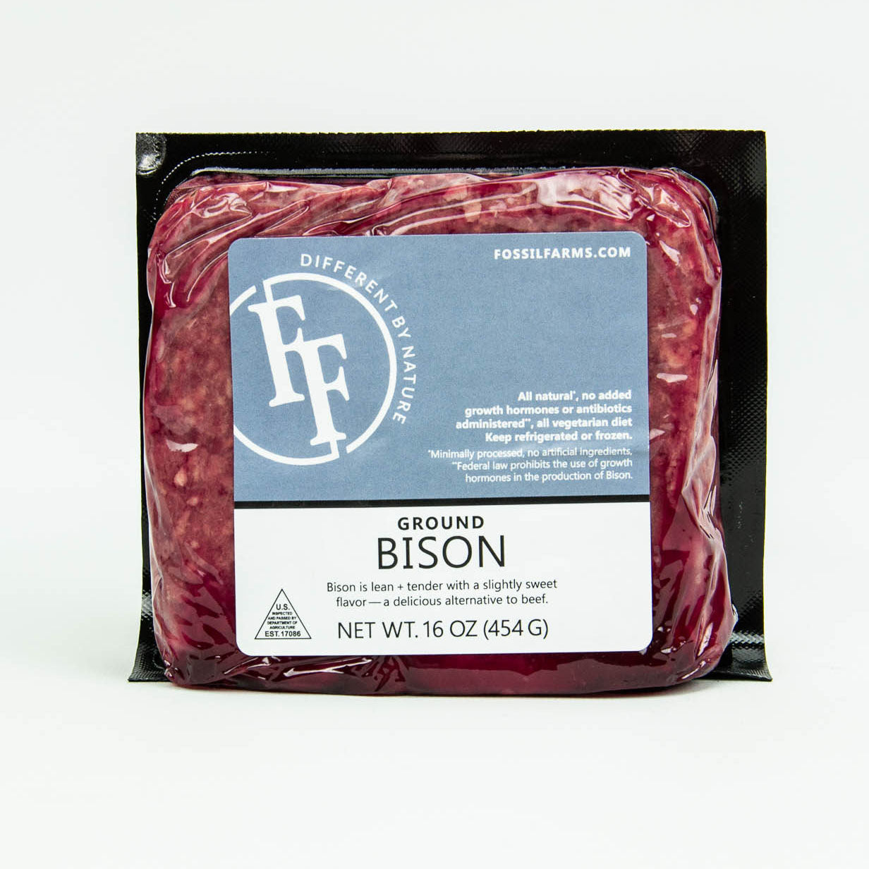 Packaged ground bison with Fossil Farms label on a white background