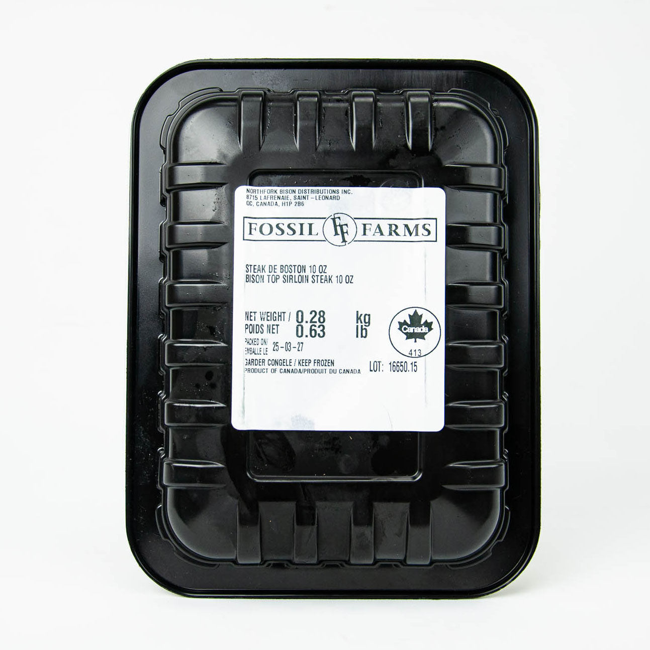 Black plastic container with a label on a white background
