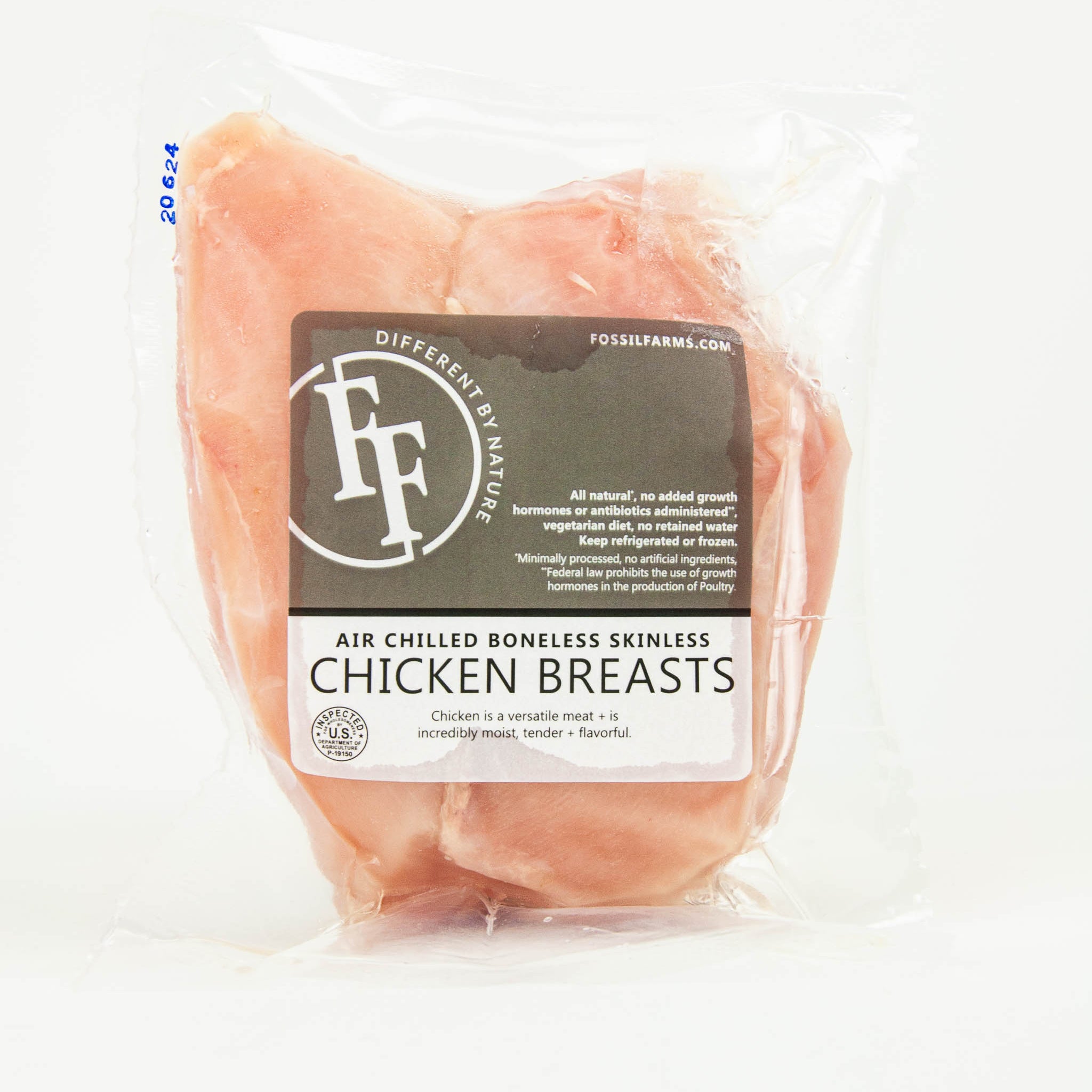 Packaged chicken breasts with a label on a white background