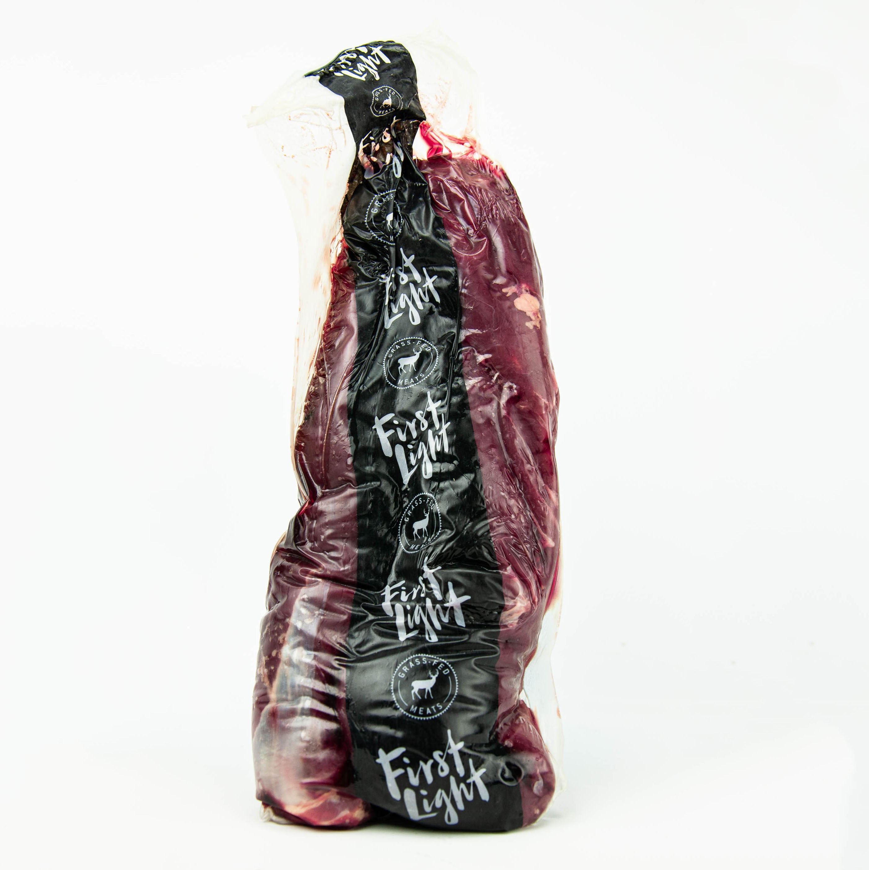 Packaged meat product with 'First Light' branding on a white background