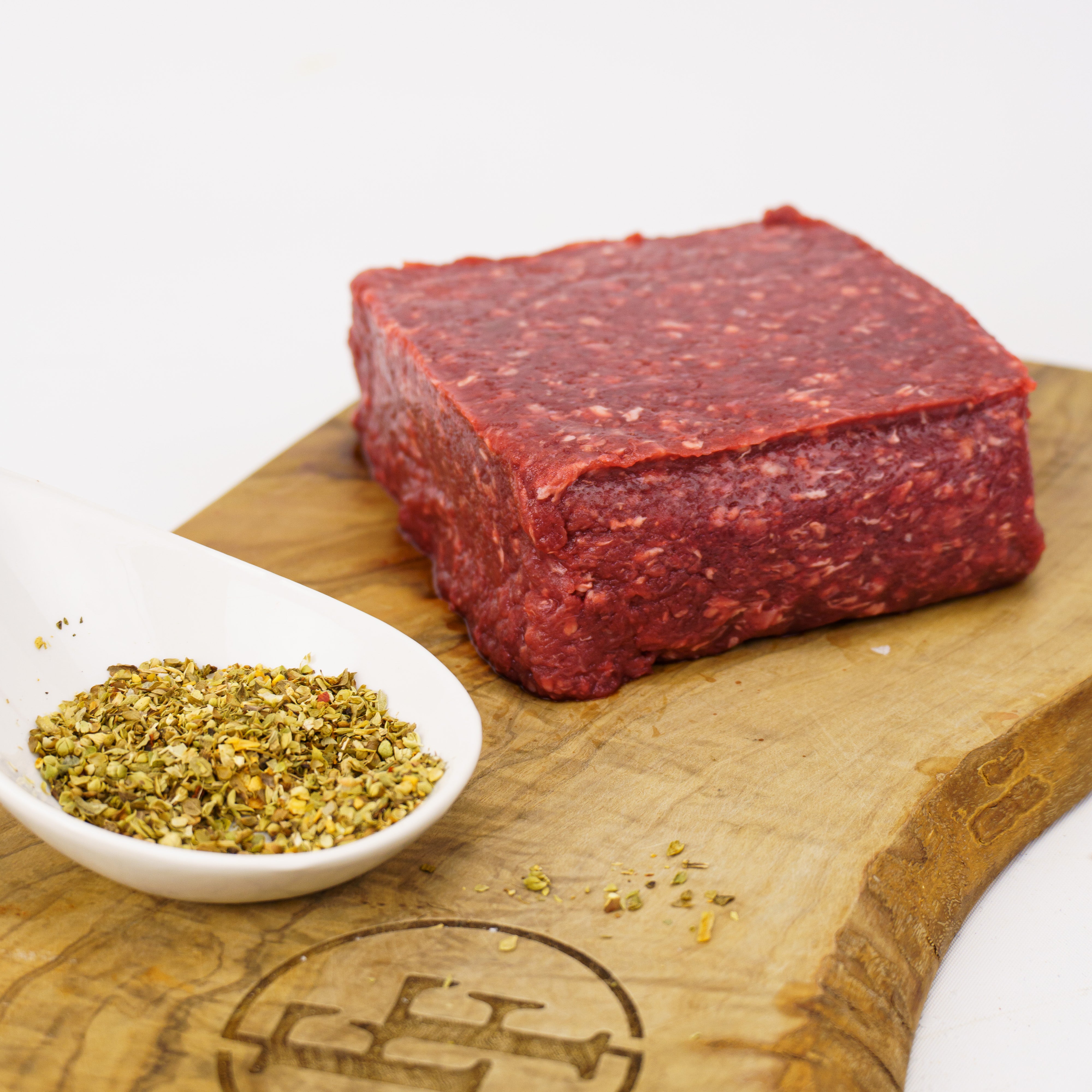 a block of raw ground elk meat