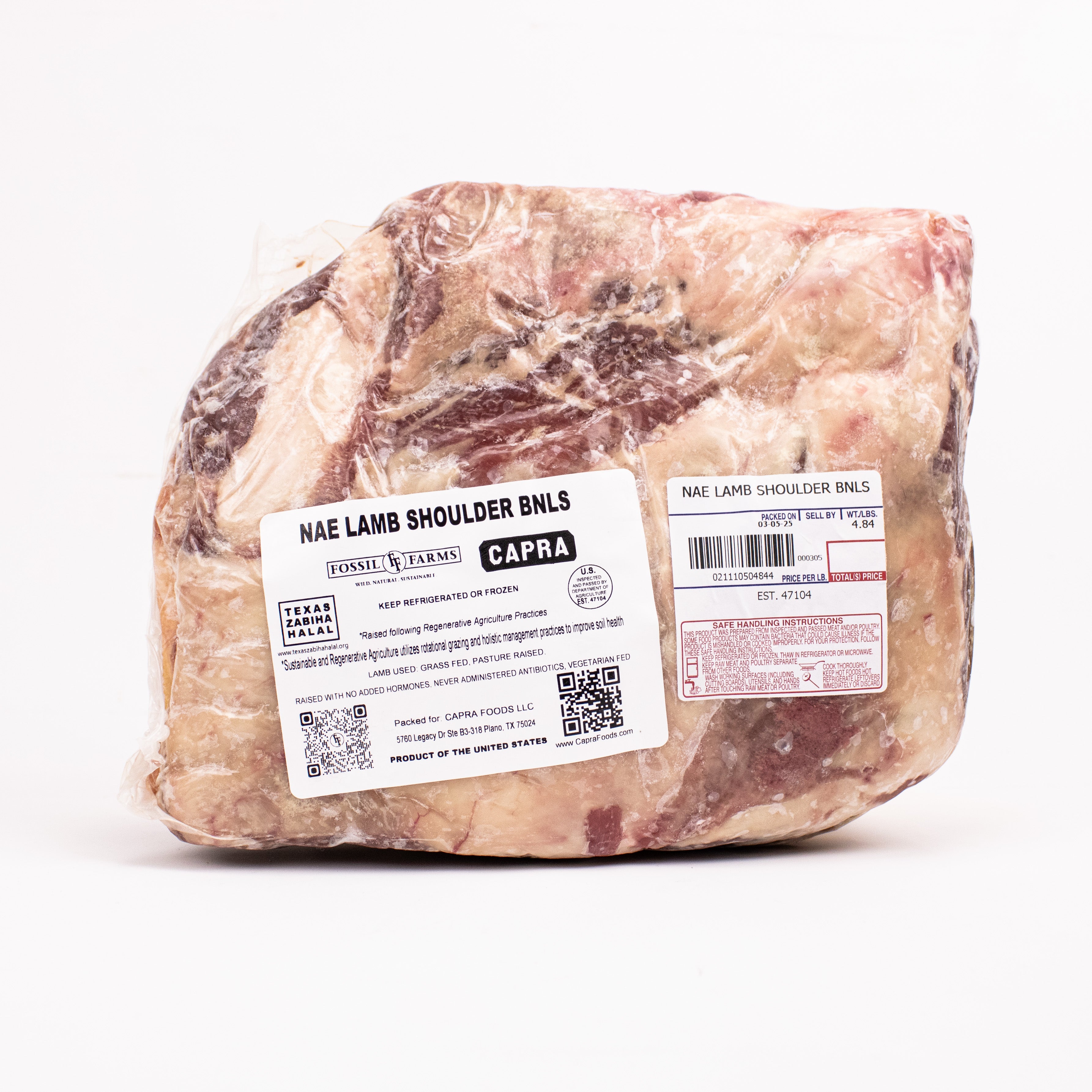 Block of raw lamb shoulder with labels on a white background