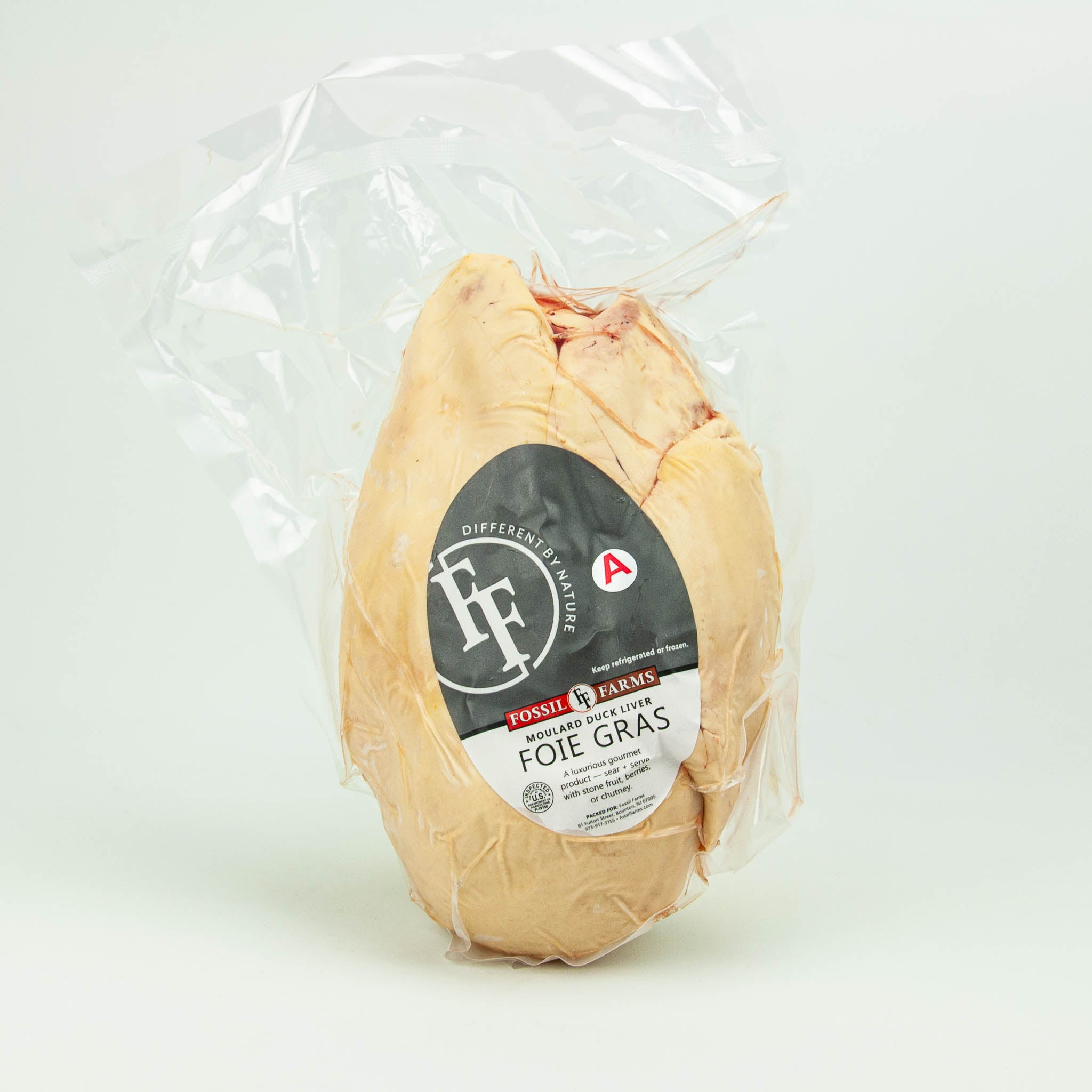 Packaged foie gras with a visible label on a white background