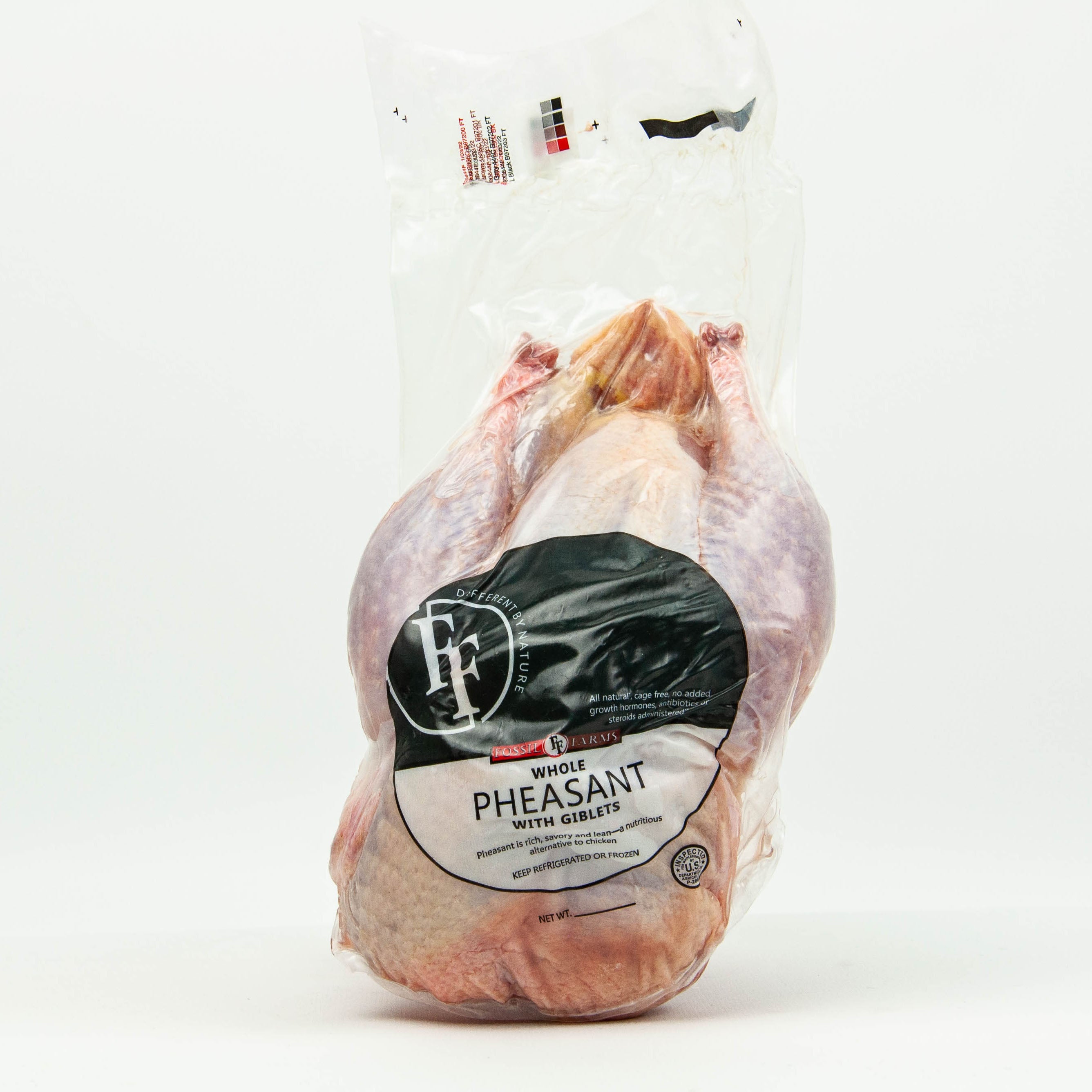 Whole pheasant in a clear plastic bag with a label on a white background