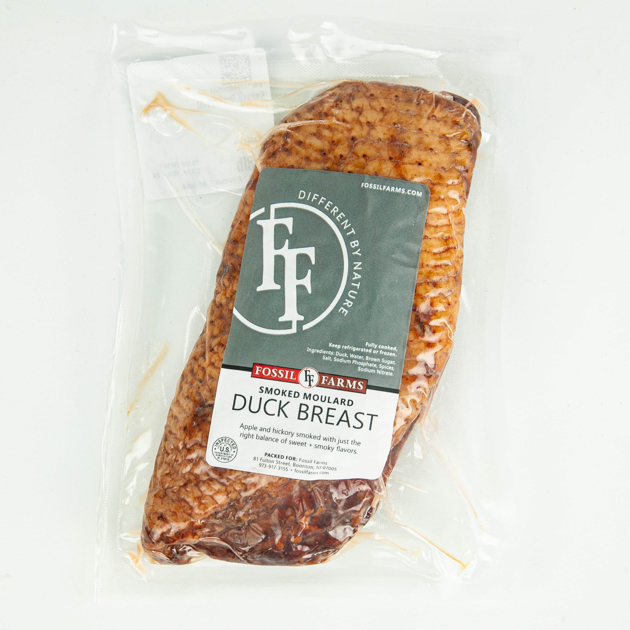 Packaged smoked duck breast with Fossil Farms label on a white background
