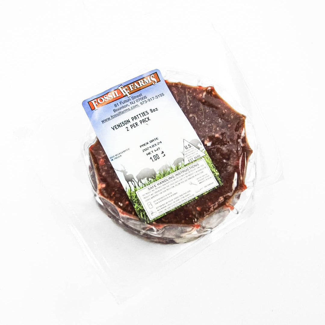 Packaged venison pate with a label on a white background