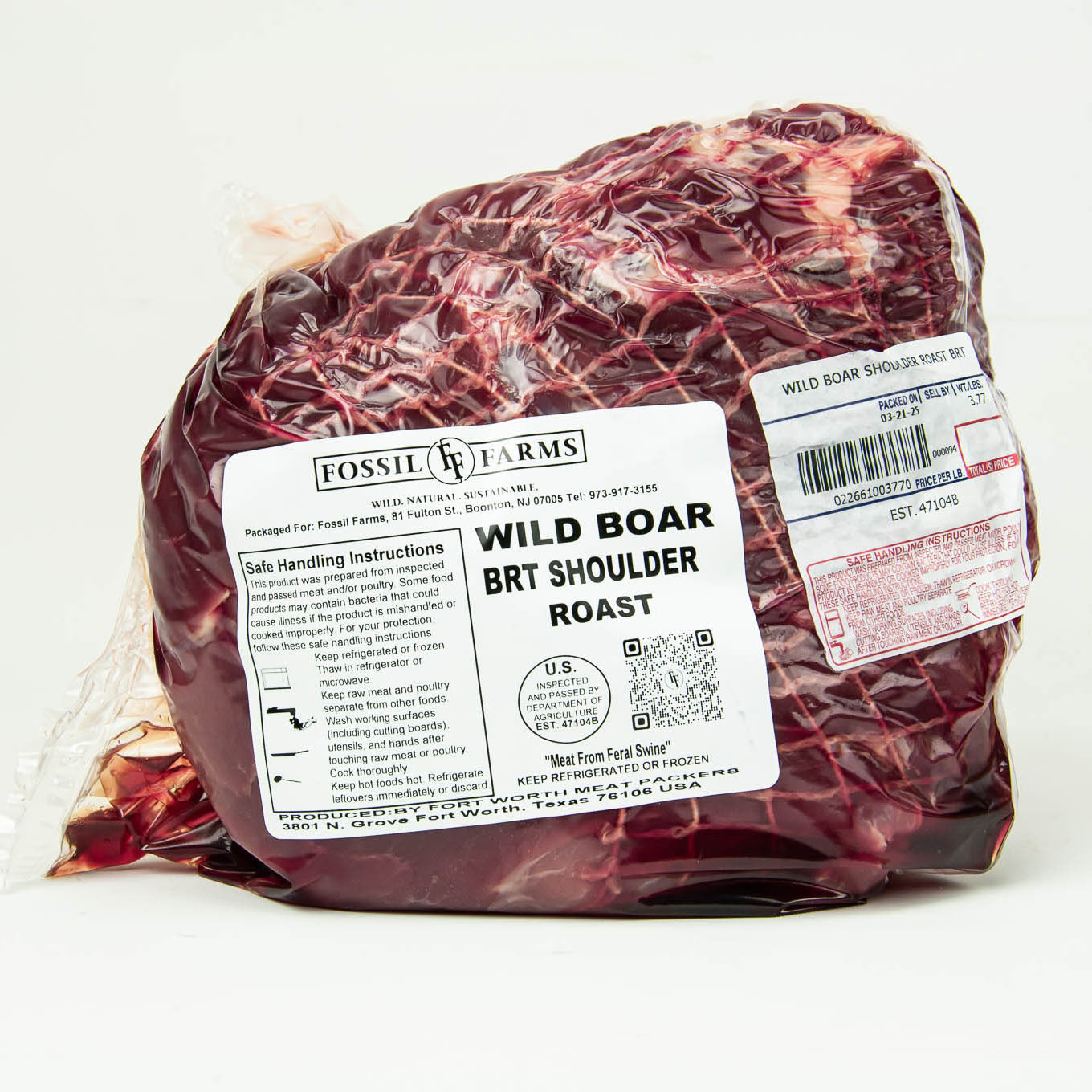 Packaged wild boar BRT shoulder roast with Fossil Farms label on a white background