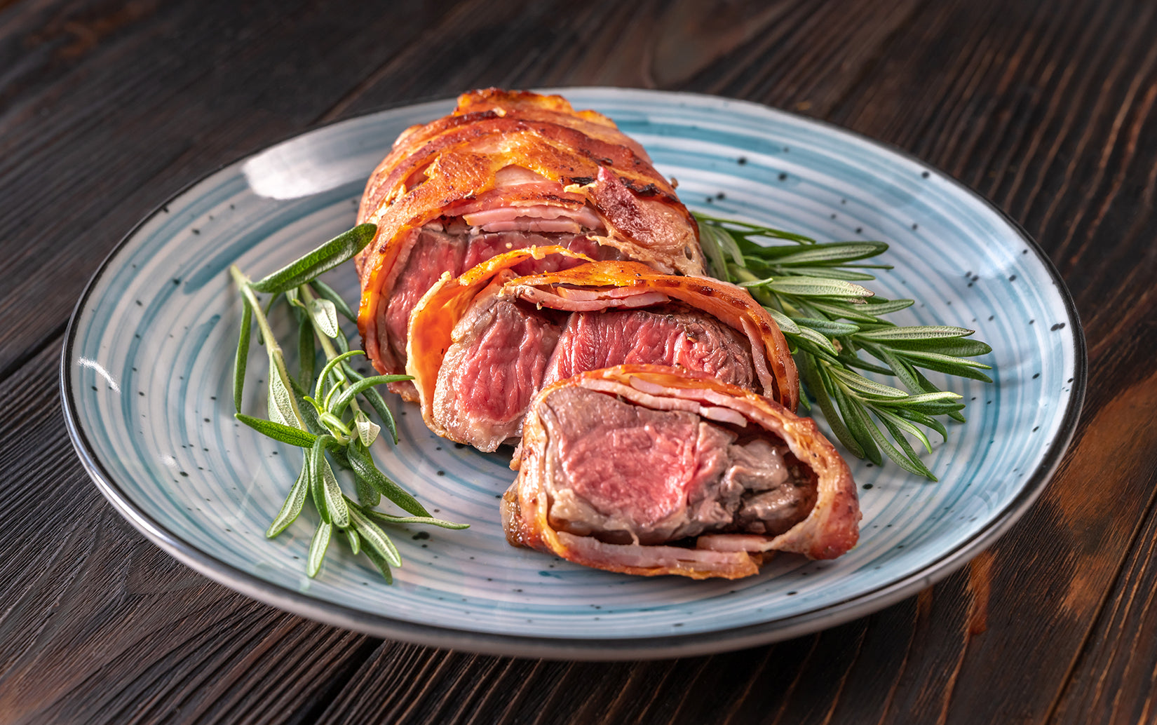 Bacon Wrapped Venison Strip Loin with a Mushroom Marsala Cream Sauce