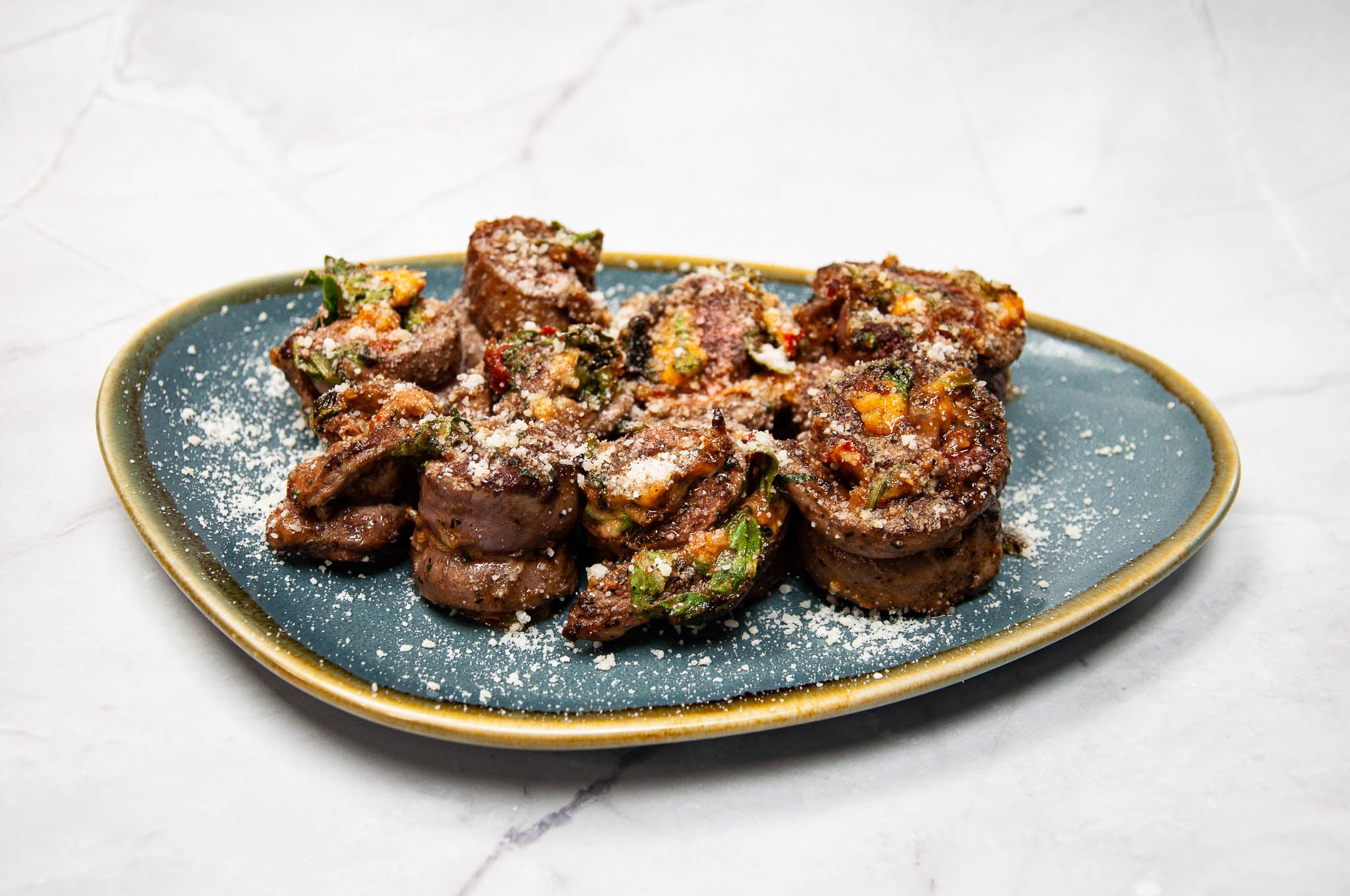 Venison Flank Steak Pinwheels with Calabrian Chili Pepper Sauce