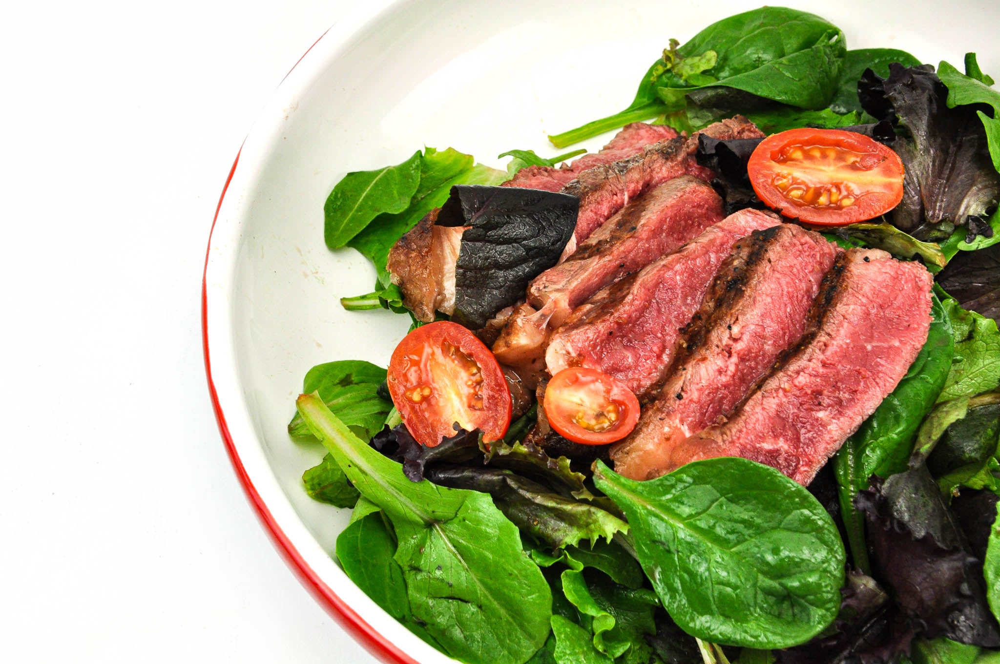 local angus beef strip steak cooked