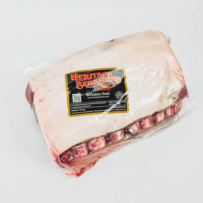 Packaged heritage Berkshire pork on a white background