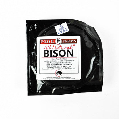 Packaged all natural bison product from Fossil Farms with a black background