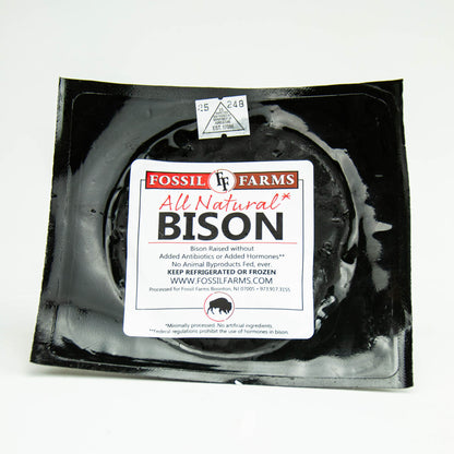 Packaged bison meat from Fossil Farms on a white background