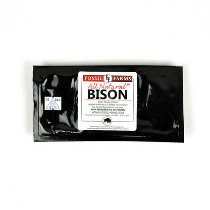 Packaged bison meat with Fossil Farms label on a white background