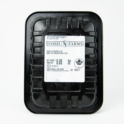 Black plastic container with a label on a white background
