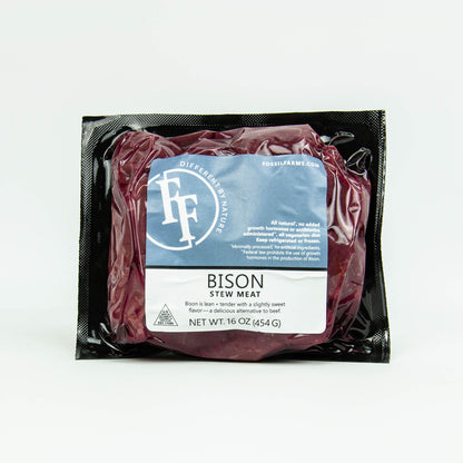 Packaged bison stew meat with a label on a white background