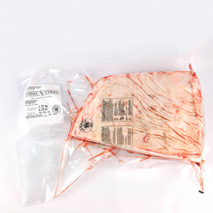Two packages of meat with labels on a white background
