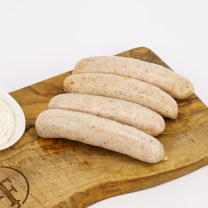 four raw chicken sausages