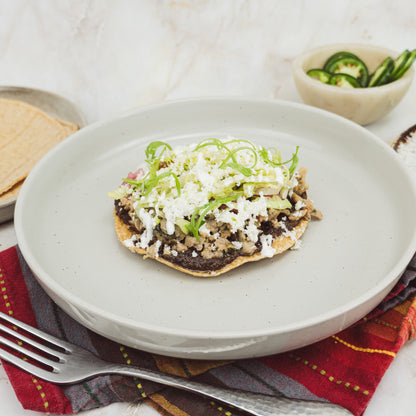 a chicken chorizo verde sausage tostada