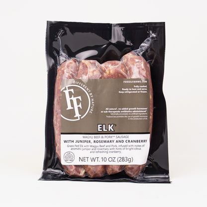 Packaged elk sausages with Fossil Farms branding on a white background