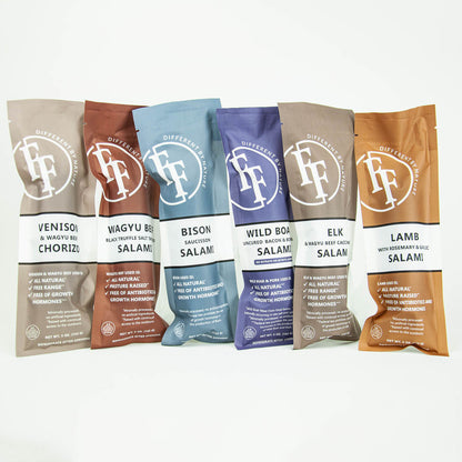 Assorted packages of different types of salami on a white background