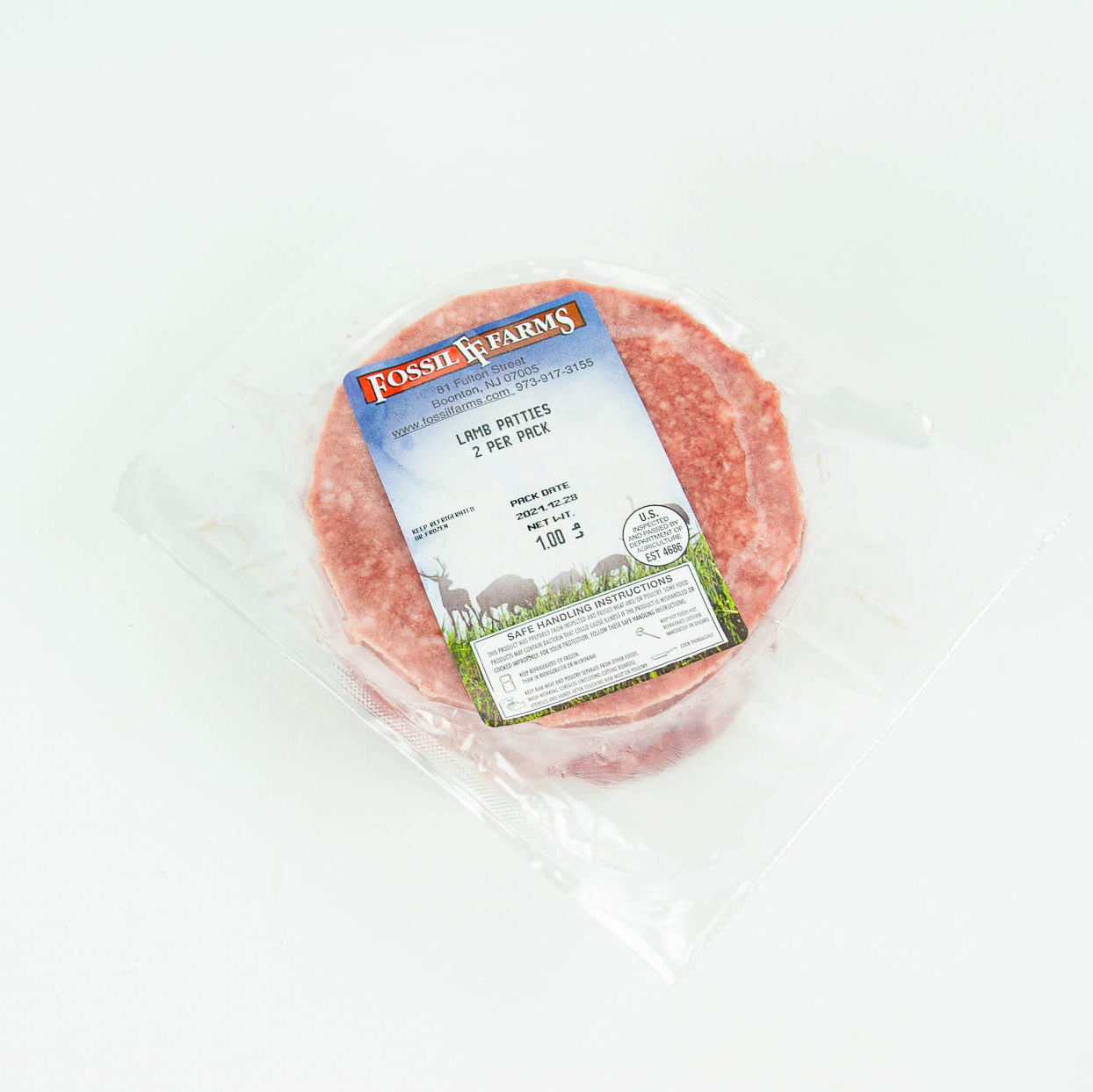 Packaged ground meat patty with Fossils Farms label on a white background