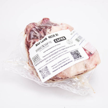 Packaged lamb neck with a label on a white background