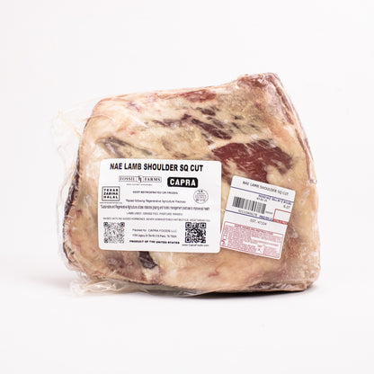 Packaged lamb shoulder cut with labels on a white background