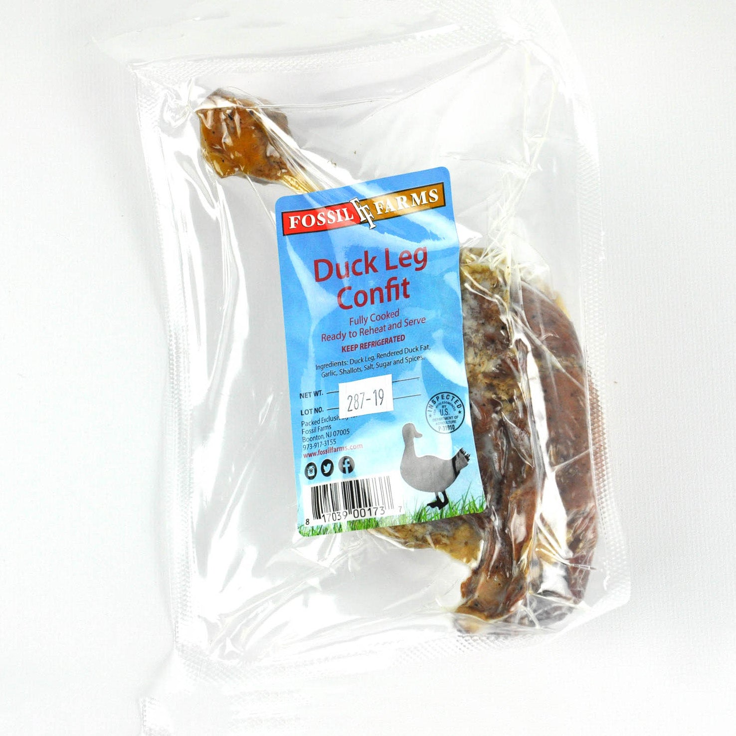 Packaged duck leg confit with a label on a white background