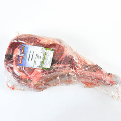 Packaged meat with a label on a white background