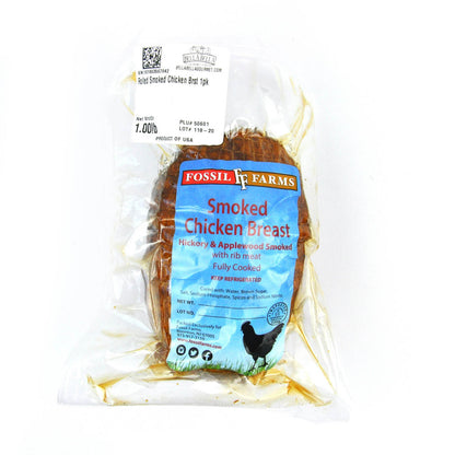 Packaged smoked chicken breast from Fossils Farms on a white background