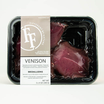 Packaged venison medallions with a label on a white background