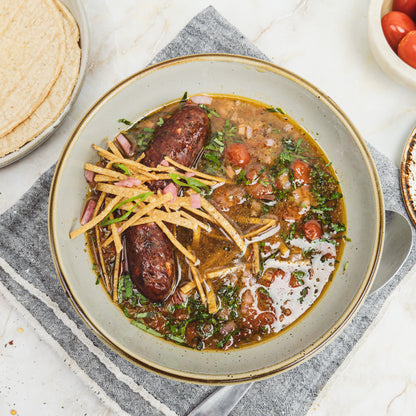 a bowl of venison sausage tomato soup