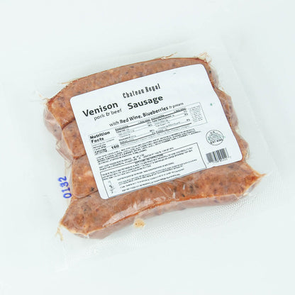 Packaged venison sausage with a label on a white background