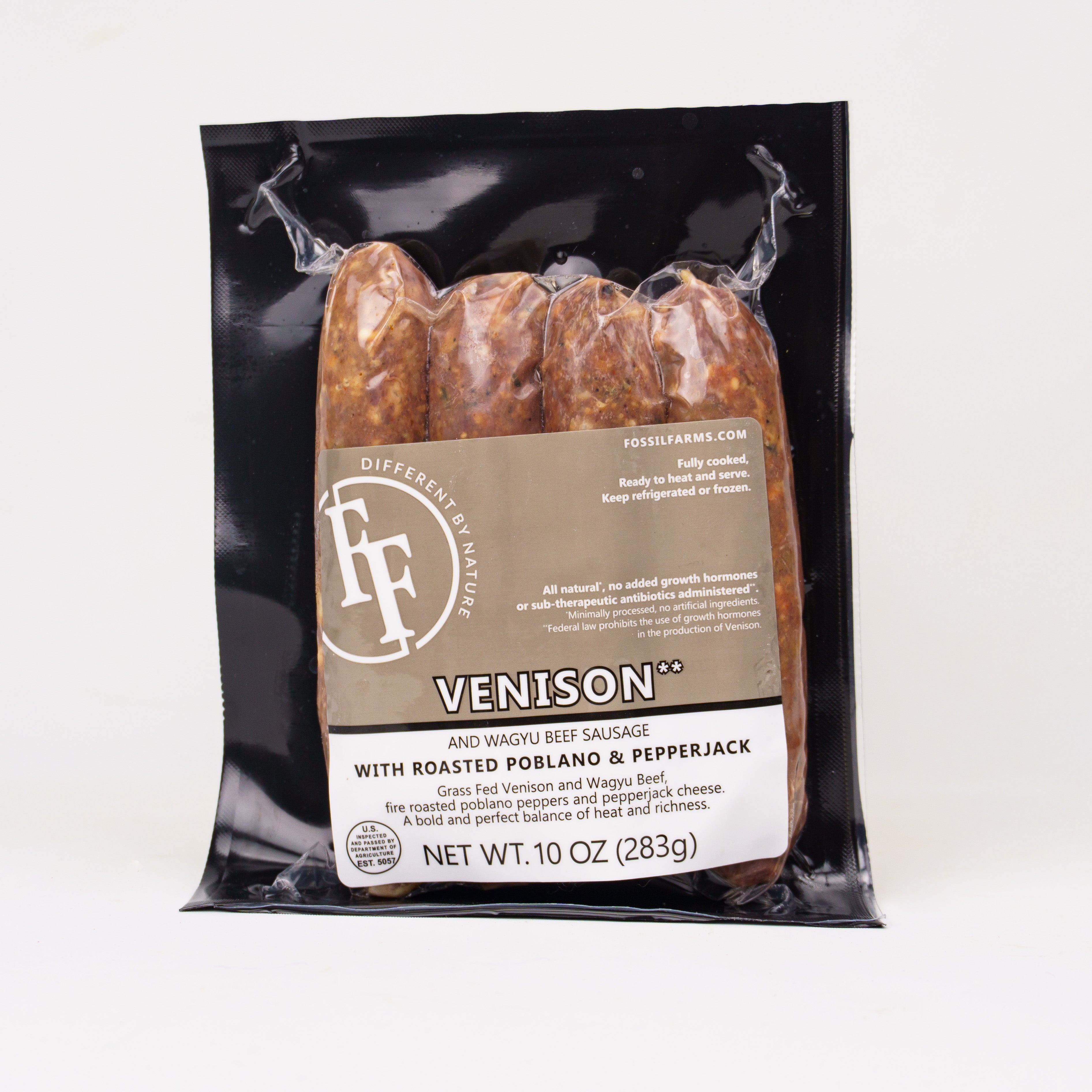 Packaged venison sausage with Fossil Farms label on a white background