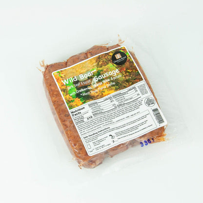 Packaged wild boar sausage with label on a white background
