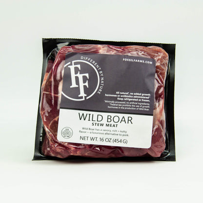 Packaged wild boar stew meat with Fossil Farms label on a white background