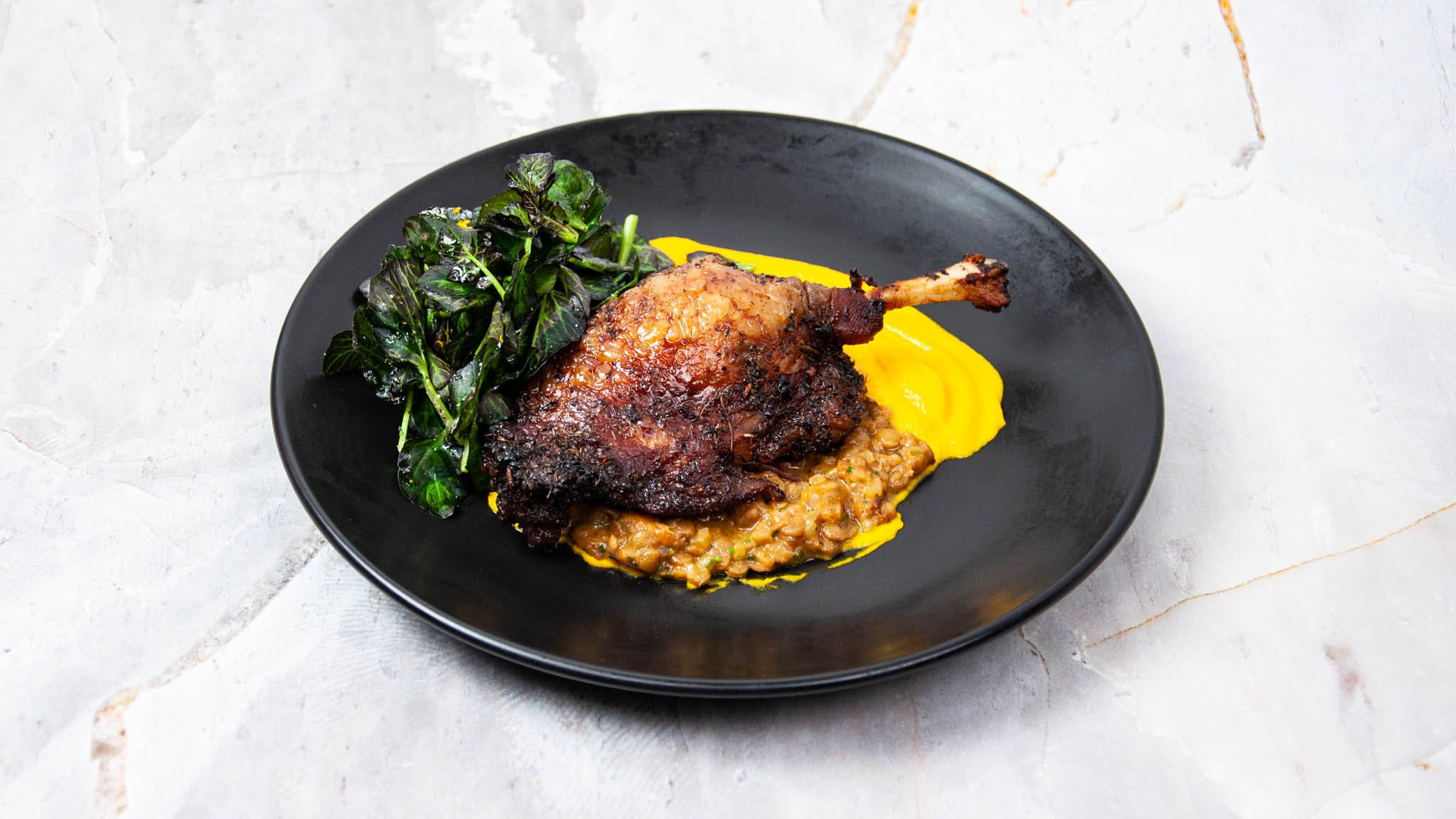 Pekin Duck Leg with Lentils with Carrot Puree