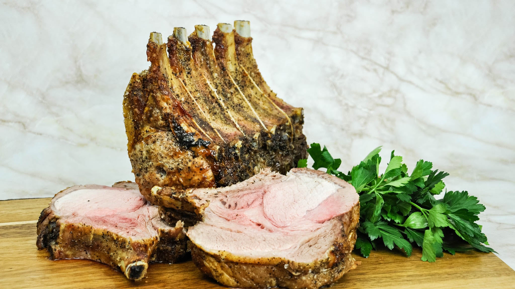 Pork Rack Cooked Berkshire Pork Frenched Rib Rack - Fossil Farms