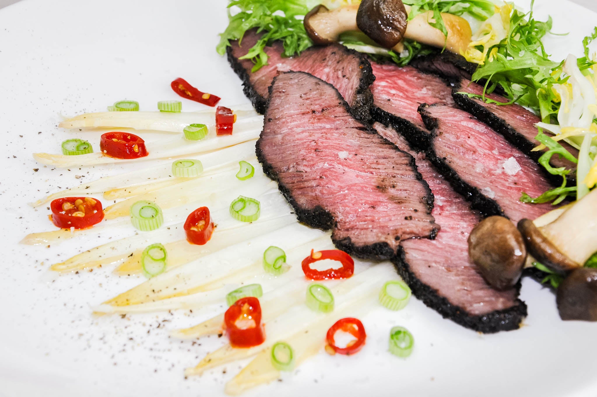 Roasted Ostrich Steak with White Asparagus and Mushrooms